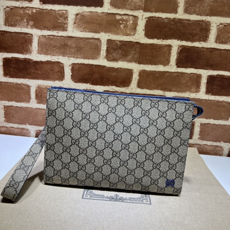 G*u*i clutch bags